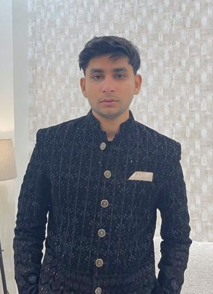 After: AuraMax member wearing a tailored black formal outfit